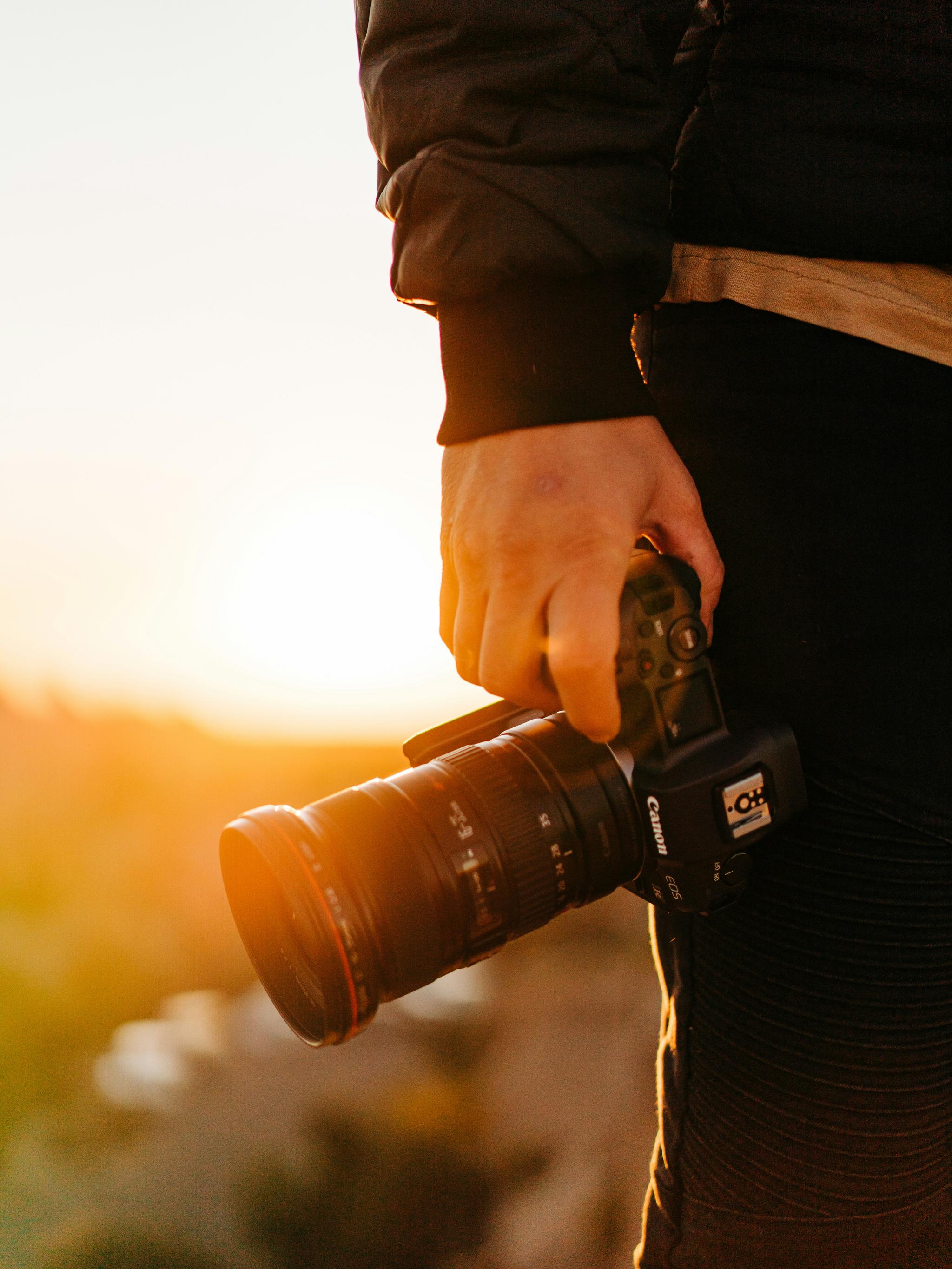 Fotograf bei Sonnenuntergang